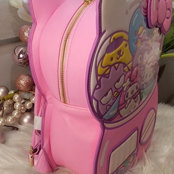 hello kitty kawaii machine figural backpack AI ACCESSORY INNOVATIONS Backpack, 16 Allover Print with 3D Iconic Hello Kitty Bow This Hello Kitty mini backpack is officially licensed Hello Kitty merch by Loungefly and features a super cute design Loungefly x Sanrio Hello Kitty